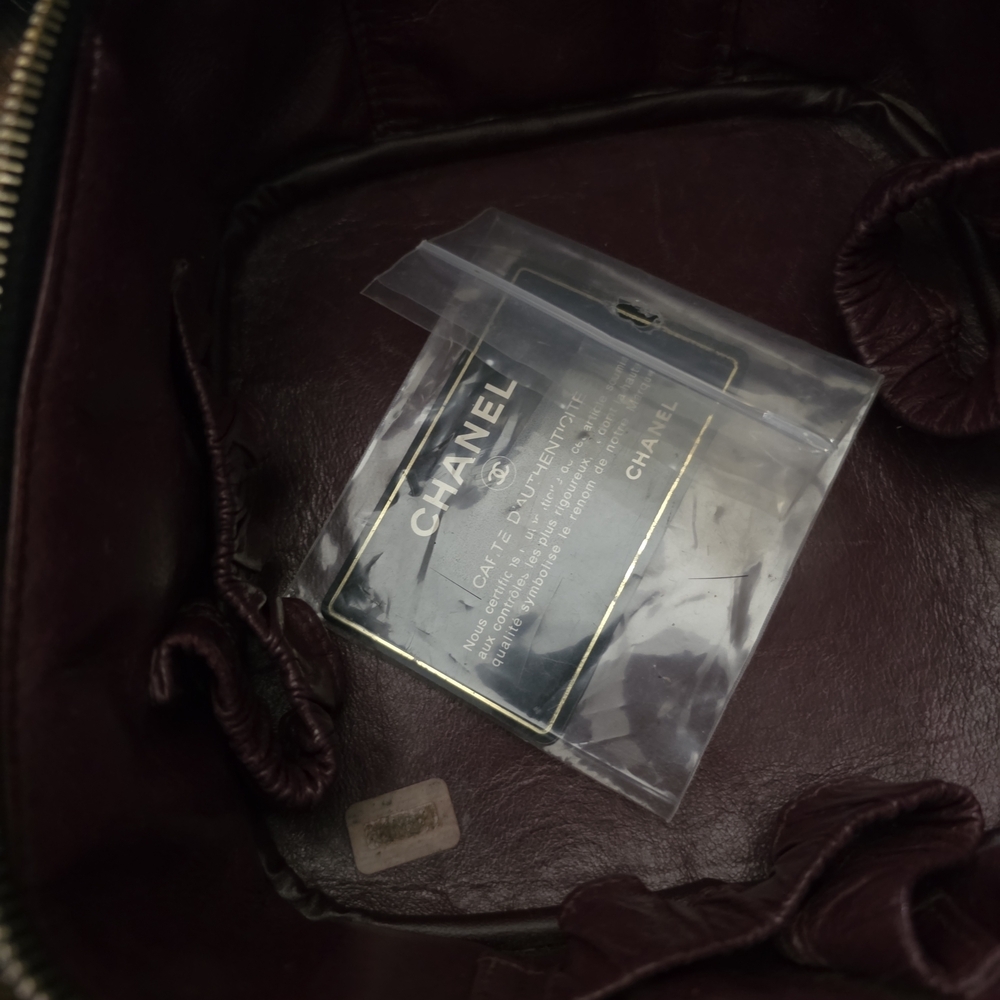 Chanel Black Quilted Mini Bag with Gold Accents - Picture 12 of 14